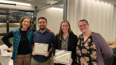 Holly, Winston, Morgan, and Emily pose with RTNN outreach awards
