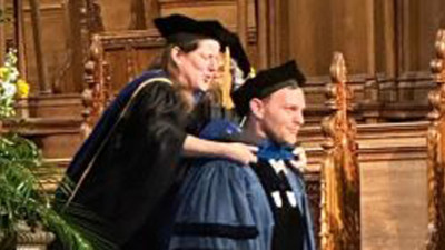 Poulsen being hooded